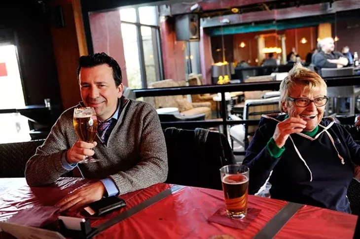 Burl Beasley and his mother, Helga, enjoy happy hour drinks at Apothecary Thirty-Nine in Oklahoma City, Tuesday, Feb. 24, 2015. - GARETT FISBECK