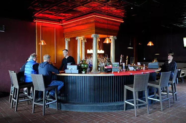 Bartender Philip Biggs makes drinks at Apothecary Thirty-Nine, formerly The Park. (Garett Fisbeck)