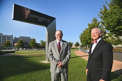 Left to right, Dr. Kent Kidwell, 2015 honorary Jazz Ambassador, and Mike McAuliffe, founder, in front of the marquee with headliner David Benoit displayed, on the lawn at the Civic Center Music Hall and Bicentennial Park, one of the locations for performances for this, the 2nd Annual OKC Jazz Fest, 9-15-15. - MARK HANCOCK