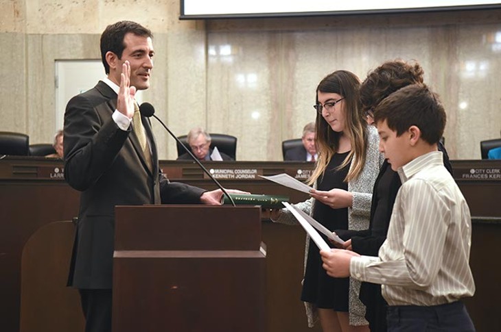 Ward 2 Councilman Ed Shadid gets sworn in for a second term by his kids  at Tuesday mornings Oklahoma City Council Meeting, 4-14-15.