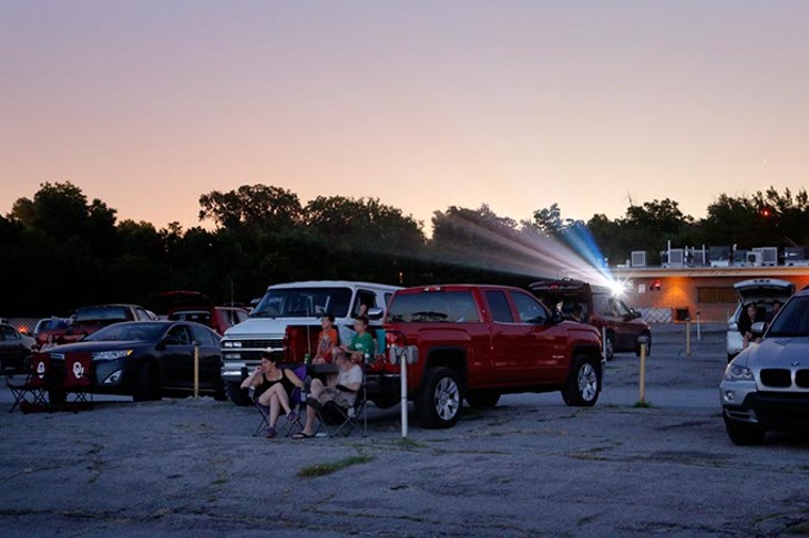 Patrons relax in the glow of high-definition film projection at Winchester Drive-In. (Garett Fisbeck)