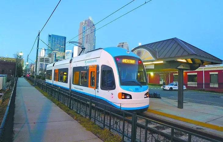 An AmeriTram streetcar featuring overhead wires. - SUBMITTED