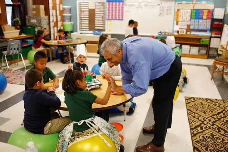 Principal Armando Ayala interacts with a first grade class at Shidler Elementary in Oklahoma City, Tuesday, Nov. 10, 2015. - GARETT FISBECK