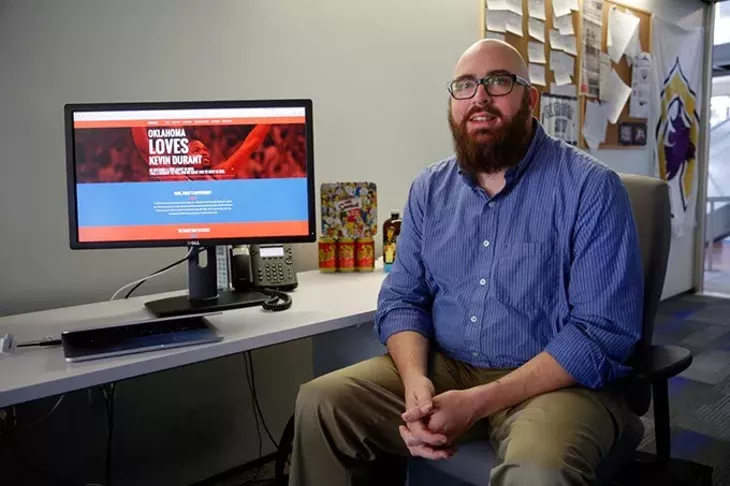 Ben Parker poses for a photo in front of his computer in Oklahoma City, Tuesday, Nov. 17, 2015. - GARETT FISBECK