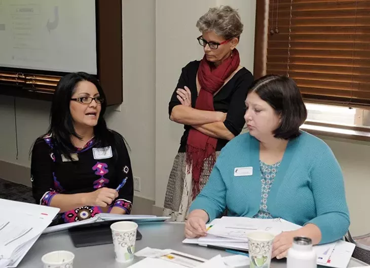 Gloria Torres, Laura Massenat and Aurora Lora talk during a recent meeting as part of OKC Public Schools’ The Great Conversation. (Garett Fisbeck)