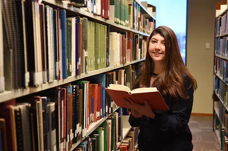 Angela Spindle, adult literacy coordinator with Oklahoma Literacy Coalition, in the John and Eleanor Kirkpartric Reading Room, at the Oklahoma History Center. mh