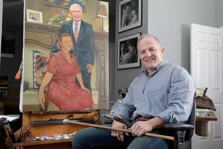 Artist Mike Wimmer poses for a photo at his home studio, Friday, Sept. 23, 2016. - GARETT FISBECK