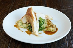 Roasted chicken breast with creamy polenta at Hutch on Avondale, Tuesday, May 2, 2017. - GARETT FISBECK