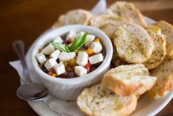 Gaberino's Italian Restaurant serves Bruschetta on Wednesday, August 31, 2016 in Oklahoma City, OK. - EMMY VERDIN