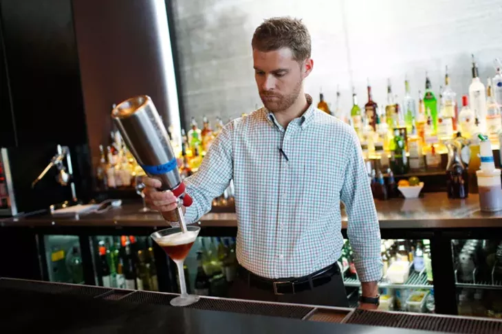 Ryan Young, bar manager, at Cafe 501 in Oklahoma City, Tuesday, Nov. 10, 2015. - GARETT FISBECK