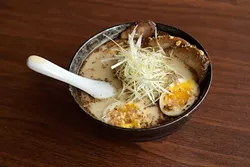 Garlic tonkatsu ramen at Yuzo Sushi Tapas Friday, April 14, 2017. - GARETT FISBECK