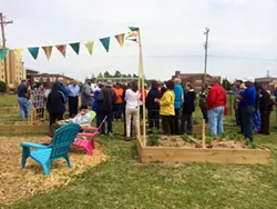 Visitors tour Urban Neighbors community garden. (Photo Urban Neighbors / provided)
