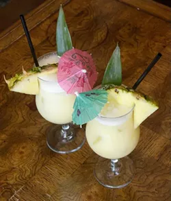 Two Piña Coladas at Rockford Cocktail Den (Garett Fisbeck)