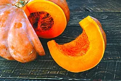 sliced pumpkin, pumpkin on the table, sliced pumpkin on the table. - BIGSTOCK