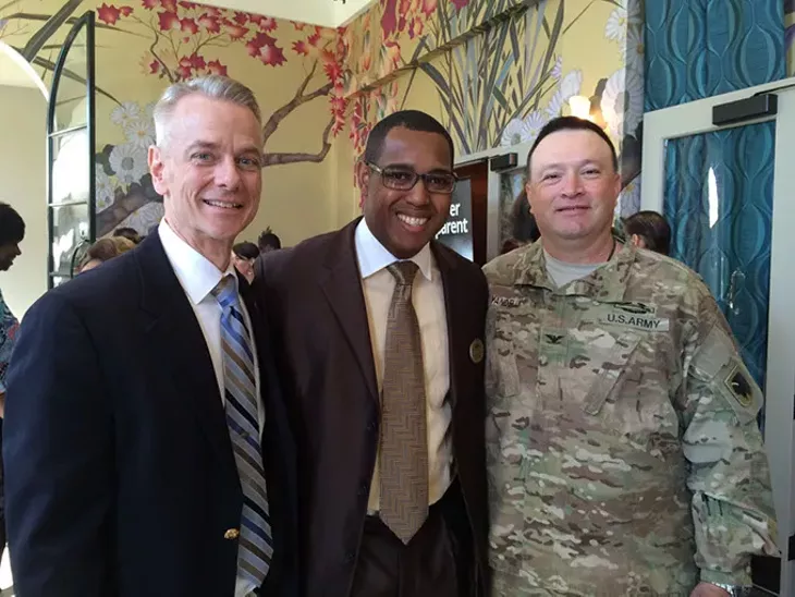 Eran Harrill center at a Black Chamber of Commerce Metro Oklahoma City event with U.S. Rep. Steve Russell left and Col. Bobby Yandell. | Photo provided