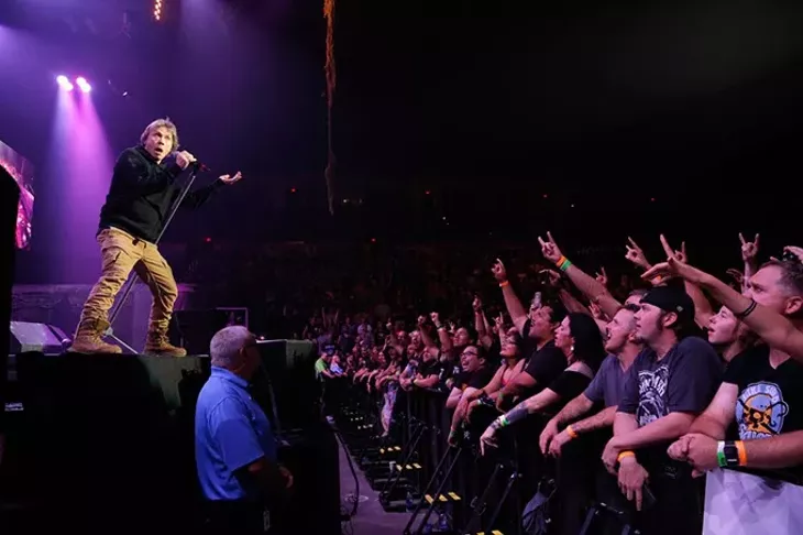 Fans react as Iron Maiden performs at the Chesapeake Energy Arena, Monday, June 19, 2017. - GARETT FISBECK