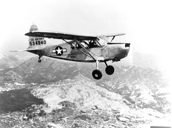 Single Vultee USAF L-5 shown in flight. This aircraft is powered by an O-series engine. - PHOTO COURTESY OF THE TINKER HISTORY OFFICE