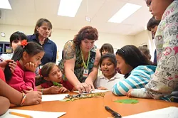 Left to right, teachers Kathleen Blake and Kristina Haden get kids into art during an after school art program at Lee Elementary School, 9-14-15. - MARK HANCOCK