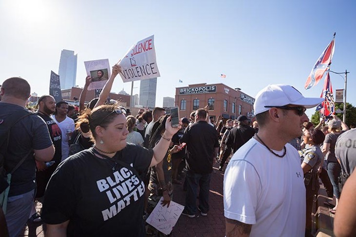 Protestors gather in Bricktown at the Black Lives Matter protest on Sunday, July 10, 2016 in Oklahoma City. - EMMY VERDIN