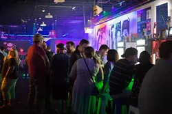 Crowd relaxes at the Flash Back Retro Pub 90's Night on Saturday, July 30, 2016 in Oklahoma City. - EMMY VERDIN