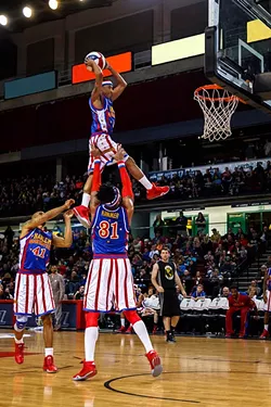 Rocket Pennington dunks a ball during a Globetrotters game. | Photo Alden Skele / The Original Harlem Globetrotters / provided - ALDEN SKEIE