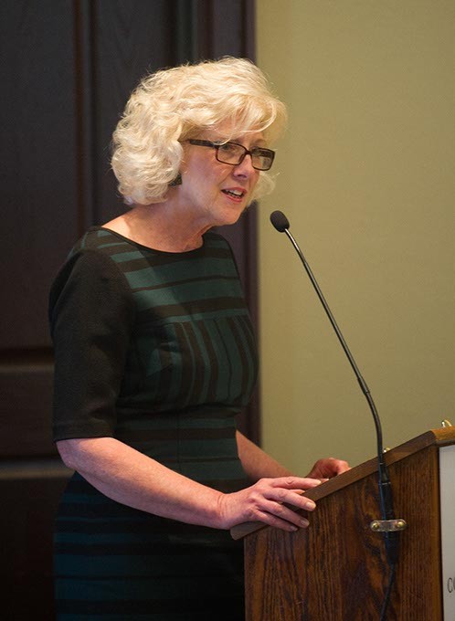 Deborah Price speaks during a ReMerge graduation at the Oklahoma City Community Foundation, Thursday, June 30, 2016. - GARETT FISBECK