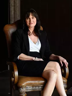Kathryn McGill poses for a photo, Wednesday, May 11, 2016. - GARETT FISBECK