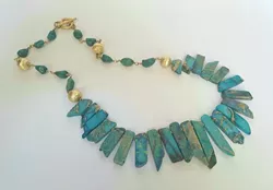 Whitney Ingram’s beaded jewelry is on display at Studio Gallery through mid-November. (Provided)