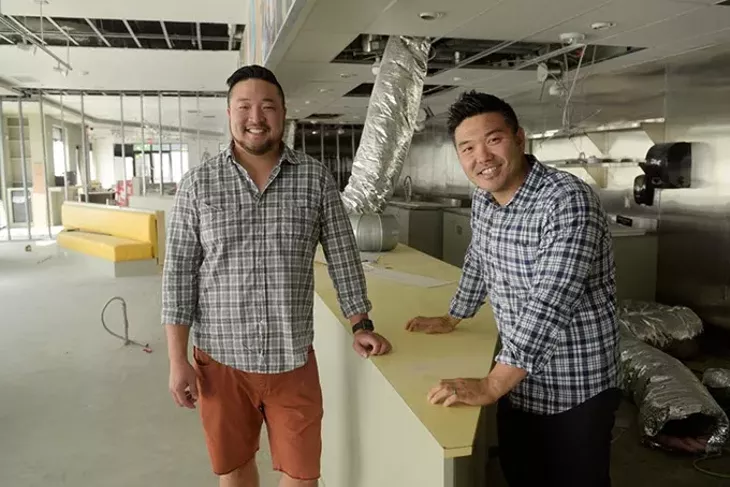 Kevin Lee and John Lee in the space that will become Korean fast-casual restaurant Gogi-Go in Midtown, Tuesday, June 13, 2017. - GARETT FISBECK