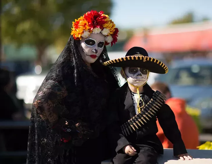 OKLAHOMA CITY, OK - NOVEMBER 1: During the Dia de los Muertos (Day of the Dead) celebration, November 1, 2015 in Oklahoma City, Oklahoma. Officials were trying to break a world record for people dressed as "La Calavera Catrinas" and "Catrins". The world record for the most in one place is 509 by Mexico City.(Photo by J Pat Carter) *** Local Caption *** ; - J PAT CARTER) *** LOCAL CAPTION *** ;