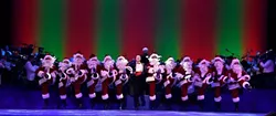 The kick line of tap-dancing Santas remains one of the highlights of OKC Phil’s The Christmas Show. | Photo Oklahoma City Philharmonic / provided