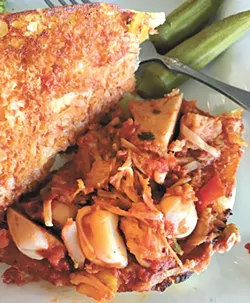 The jackfruit pulled “pork” sandwich with a side of steamed broccoli (Photo Jacob Threadgill)