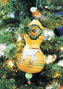 Trees are decorated with ornaments from 19 tribes in Oklahoma. A separate tree includes ornaments for sale. | Photo Doug Hoke / Red Earth / provided