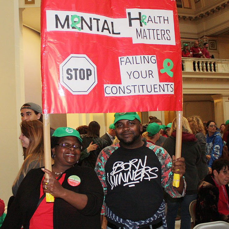 Sharon Smith and Marlon Smith protest proposed cuts to the Oklahoma Department of Mental Health and Substance Abuse Services at the Oklahoma Capitol last week. (Photo Laura Eastes)
