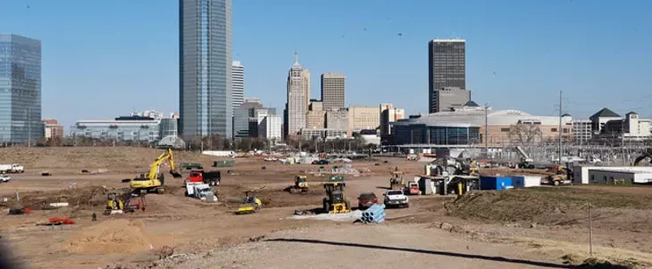 Construction crews and equipment sit on the future site of the 40-acre upper section of Scissortail Park, a MAPS 3 project, near downtown Oklahoma City. (Photo Laura Eastes)