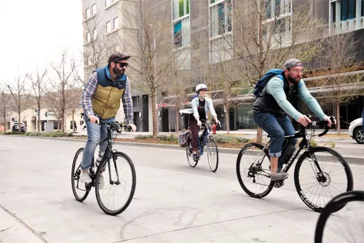 Cyclists travel in downtown Oklahoma City to visit proposed bicycle infrastructure in bikewalkokc’s draft plan last week. | Photo Laura Eastes