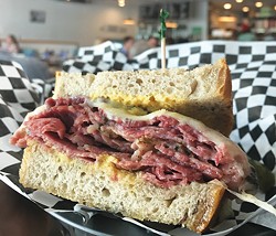 The New York, NY is the most popular sandwich at Scottie’s Deli, pairing pastrami with corned beef. - JACOB THREADGILL