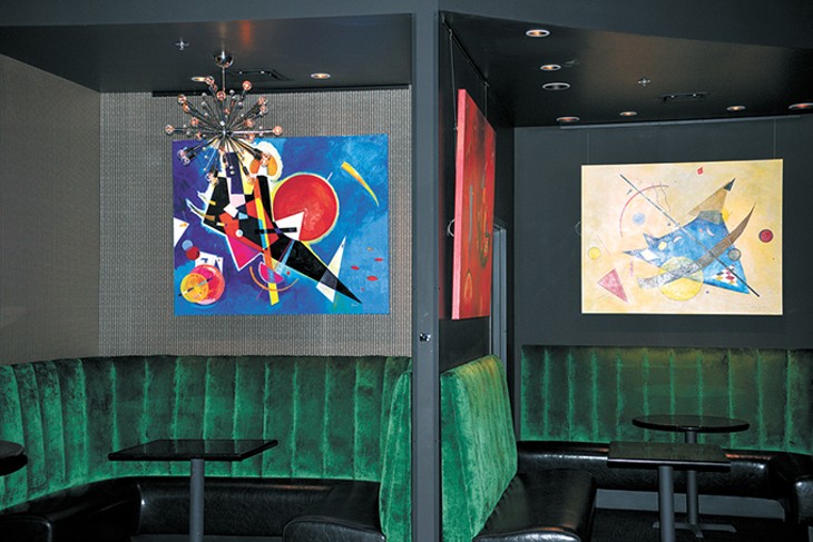 Local artist Brent Learned custom-made several abstract paintings for The Liszt Nightclub + Lounge. - BEN LUSCHEN