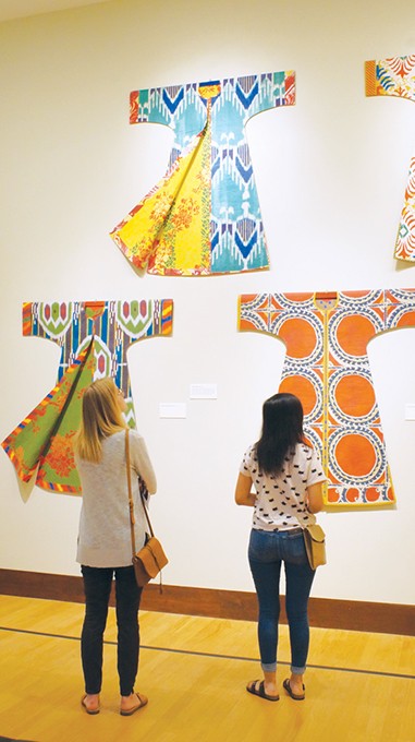 Museumgoers view a portion of Isabelle de Borchgrave’s recreations of historical fashion by early 20th-century Spanish designer Mariano Fortuny. - MEG CHERIE