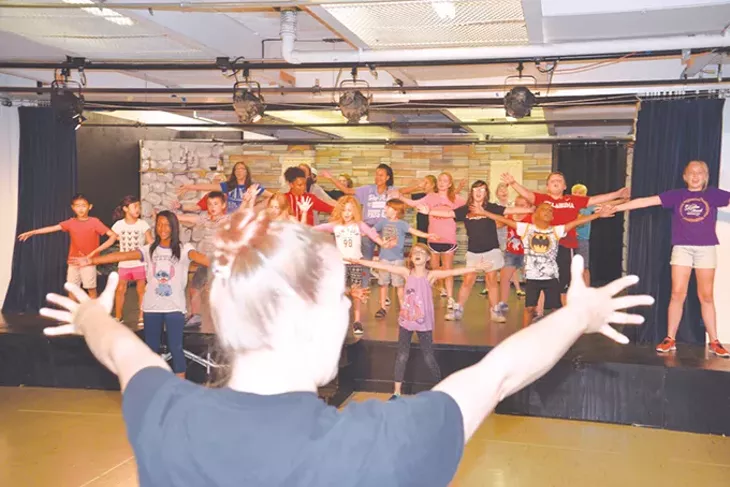 Choreographer Kelsey Faulk leads students through a routine for an upcoming production of The Frog Princess. - JACOB THREADGILL