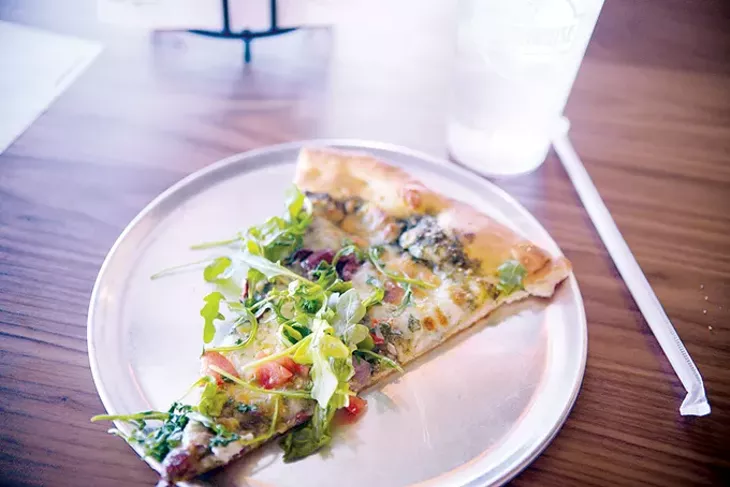 The Yaya Veg is one of the most popular specialty pizzas at Wheelhouse Pizza Kitchen. - JACOB THREADGILL