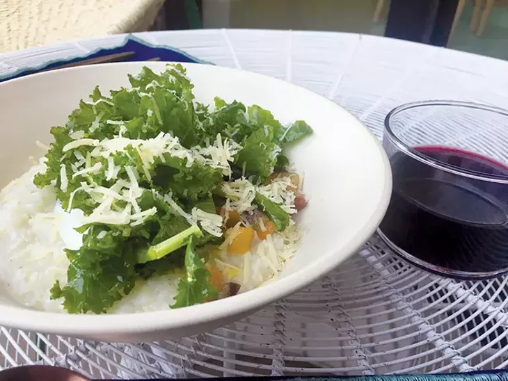 Pancetta and greens served over polenta is a menu item at the new kitchen at Commonplace Books. - JACOB THREADGILL