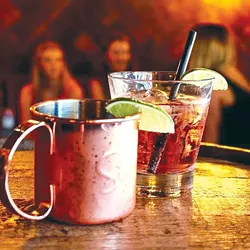 Classic cocktails pair perfectly with the restaurant’s mid-century aesthetic. - PROVIDED