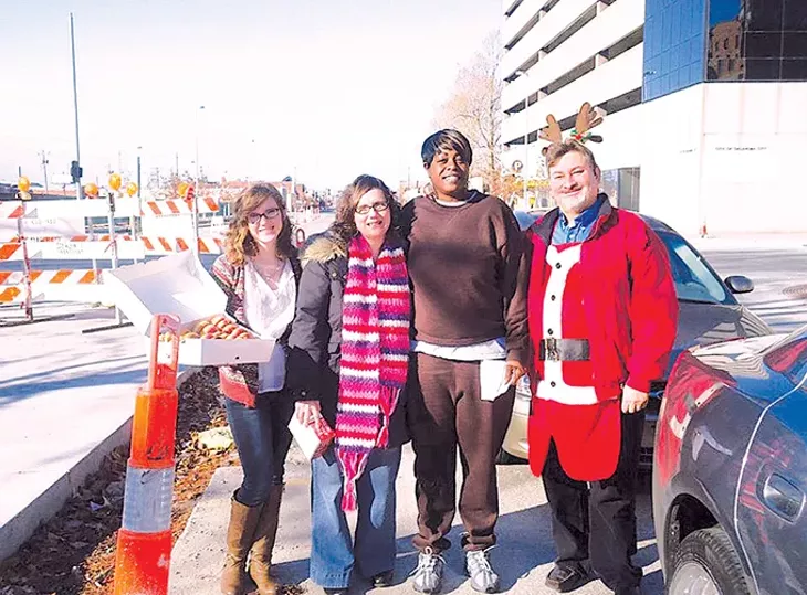 Founder Rick Swyden has had help from outreach coordinator Beth Solis second from left, her daughter Sarah Nawotka left and former Hotdogs for the Homeless hotdog recipient Sherry Hassell since at least 2011. - HOTDOGS FOR THE HOMELESS / PROVIDED
