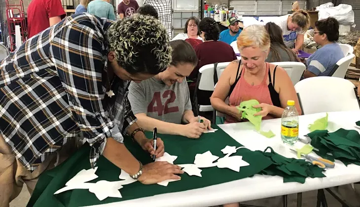 from left Factory Obscura volunteers Kaalen O’Bannon, Alena Snyder and Kaylyn Cavett work together to create felt art leaves. - NAZARENE HARRIS
