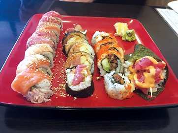 from left Rainbow rolls, spicy yellowtail, spider rolls and a spicy tuna hand roll at Shawn’s Sushi - JACOB THREADGILL