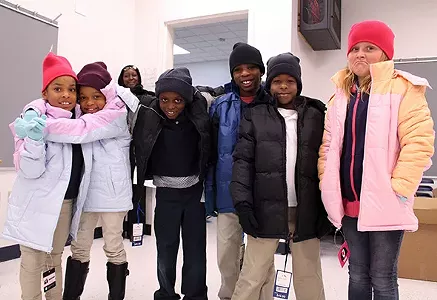 Parks Elementary School students strike a pose after receiving new gloves, beanies and winter coats through The Foundation for Oklahoma City Public Schools’ Coat-A-Kid program. - PROVIDED