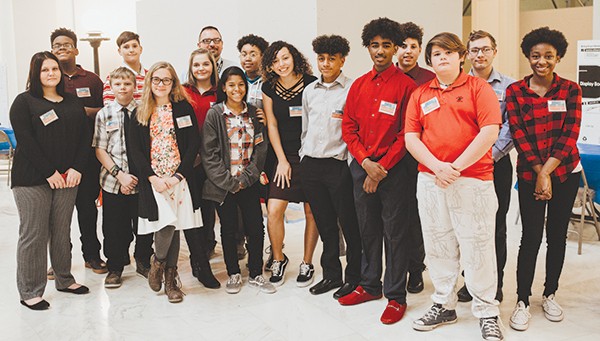 Aaron Baker’s eighth-grade civics class from Del Crest Middle School gathered at the capitol Dec. 7 to advocate for an update to the state’s AIDS education mandate. - ALEXA ACE