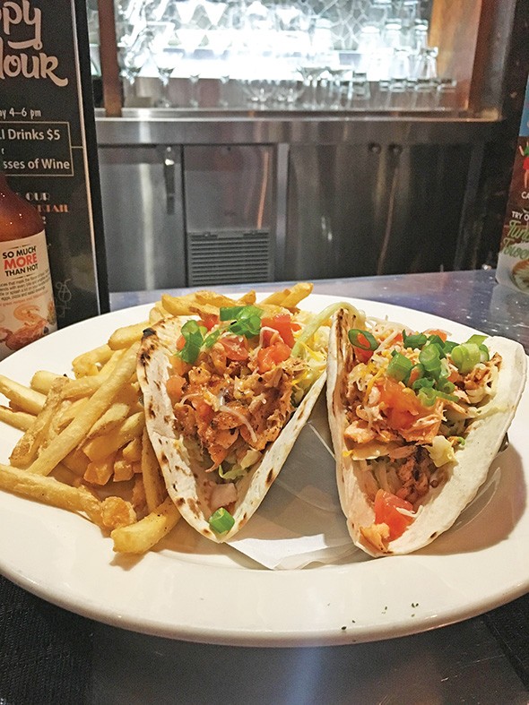 A lunch portion of salmon tacos with fries at Pearl’s Oyster Bar - JACOB THREADGILL