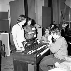 Accompanying orchestral arrangements of Beatles songs, Revolution features a multimedia presentation including hundreds of rarely seen photos of the band. - BEATLES BOOK PHOTO LIBRARY (BBPL) / PROVIDED
